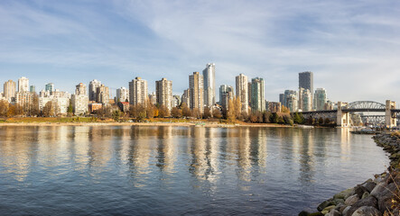 Panoramic View of Modern Downtown Cityscape during a sunny fall day. Sunset Beach in False Creek, Vancouver, British Columbia, Canada.