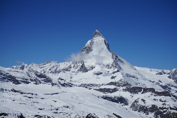 Matterhorn with snow and blue sky
