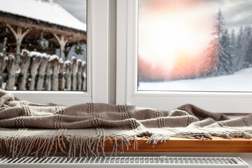 A winter window, a sill with a vacant seat on a beautiful Christmas day 