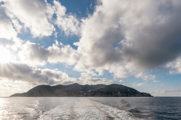 Panoramic view of the Island of Gorgona, Italy, with dramatic sky