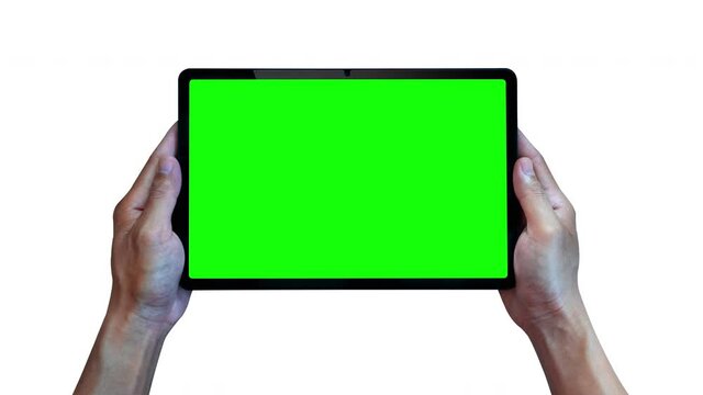 Hands holding tablet with green screen isolated on white background.