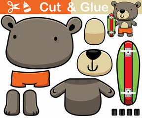 Vector illustration of bear cartoon with skateboard. Education paper game for children. Cutout and gluing