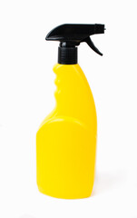 Yellow plastic bottle with black puller on a white background. Household chemicals for the home.