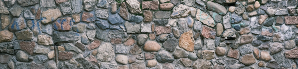 an old stone wall textured colored background