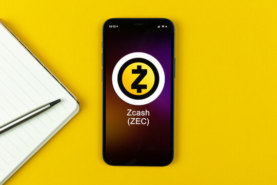 Zcash ZEC symbol. Trade with cryptocurrency, digital and virtual money, banking with mobile phone concept. Business workspace, table top view photo