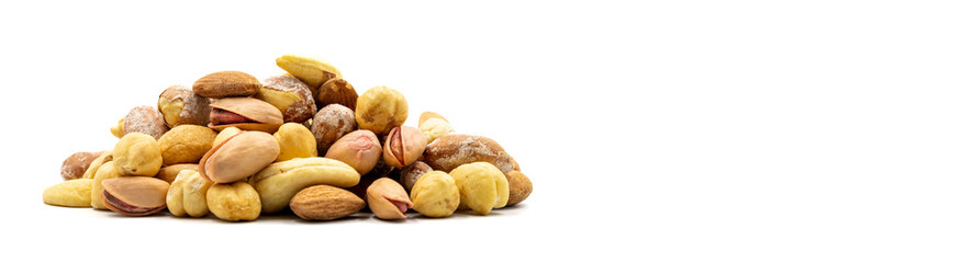 Obraz premium Mixed nuts isolated on white background. Snack fresh nuts. close up. Empty space for text. Copy space