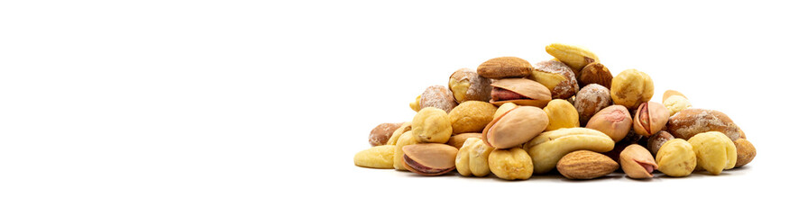 Mixed nuts isolated on white background. Snack fresh nuts. close up. Empty space for text. Copy space