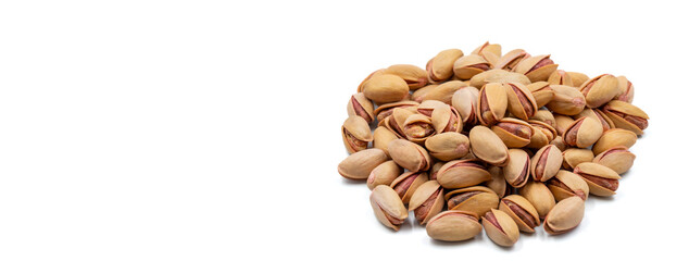 Pistachios isolated on white background. Snack fresh nuts. close up. Empty space for text. Copy space