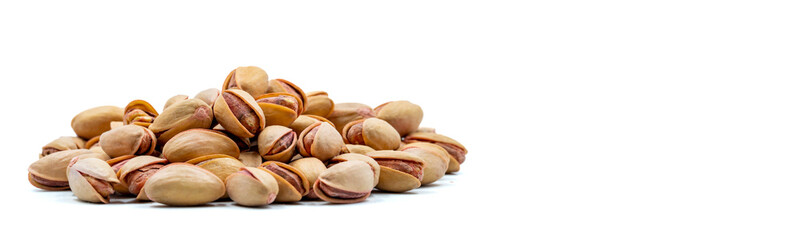 Pistachios isolated on white background. Snack fresh nuts. close up. Empty space for text. Copy space