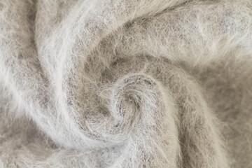 Swirl of alpaca fabric and mohair wool texture - obrazy, fototapety, plakaty