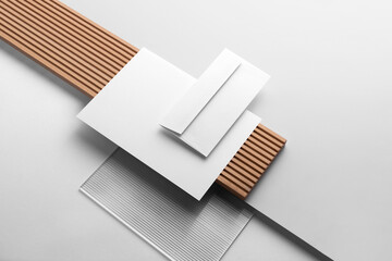 Branding stationery mockup template, with reeded glass and wooden elements, real photo, letterhead, folder, brochure, business card, envelope. Blank isolated on white background to place your design. 