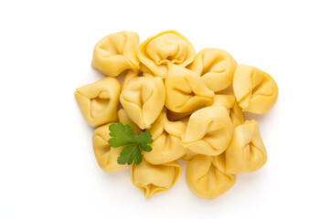 Raw homemade pasta,tortellini with herbs.