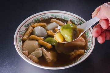 Thai dessert call bua loy make from cassava starch in Ginger Juice