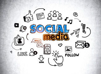 Sketch with social media icons on concrete wall