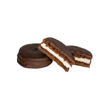 Chocolate cookies in chocolate glaze and slices isolated on a white background. Top view.