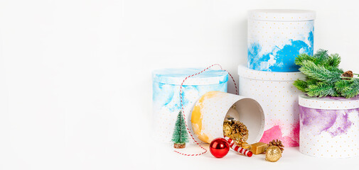 Christmas beautiful gift round boxes. Christmas items on a white background with space for text. Banner