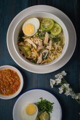 Chicken Soto or Soto Ayam in Indonesia. Soto ayam is a traditional Indonesian dish which uses ingredients such as chicken, vermicelli, bean sprout with turmeric as main ingredient add in the broth.