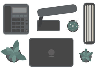 パソコンや電話、書類ケース、スタンドライト、観葉植物のセット（机上俯瞰のイメージ）