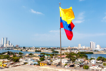 Colombian flag on top of the Castillo San Felipe de Barajas, a fortress in Cartagena, Colombia, South America