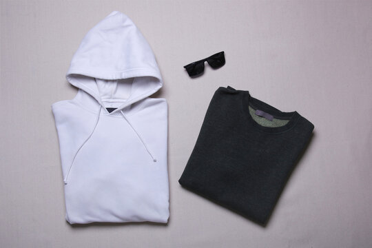 Folded sweatshirt and hoodie mockup on grey background. Flat lay men s outwear template Stock Photo Adobe Stock