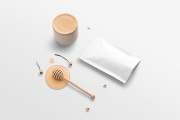 Blank tea bag packaging mockup, cvontainer, with honey, spoon, camomilla, top view, packaging...