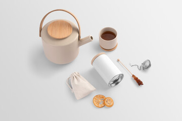Obraz na płótnie Canvas Blank tea packaging container, pot, teacup, bag, dried fruits, sugar stick, on a white background, packaging mockup with empty space to display your branding design.