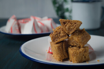 Enting-enting gepuk, traditional sweets from Salatiga, East Java, Indonesia. A sugary peanut mold into triangle shape