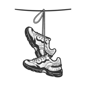 sneakers hanging on a wire sketch engraving vector illustration. T-shirt apparel print design. Scratch board imitation. Black and white hand drawn image.