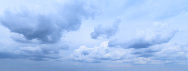 Summer cloudy sky.
Photographic image, white, blue colors
monochrome, panorama, horizontal. - 470687747