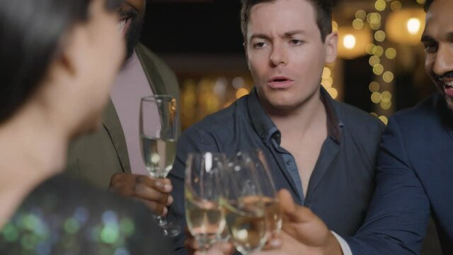 Tracking Shot of Friends Toasting Their Drinks