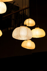 Chinese lanterns are in the form of hanging lamps.
