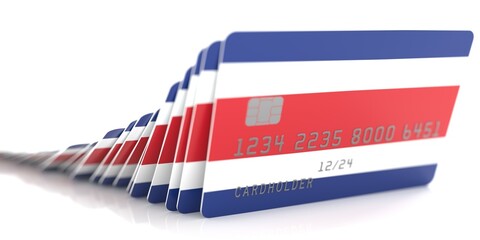 Line of fallen credit cards with flags of Costa Rica on white background, 3d rendering