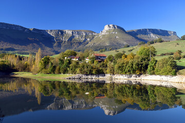 Obraz premium Maroño water reservoir and mountains of Sierra Salvada. Alava. Basque Country. Spain