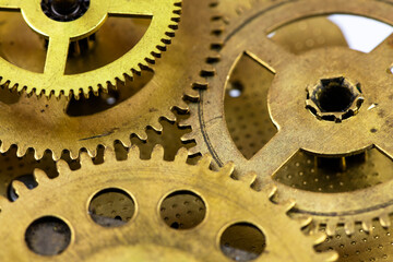 Old clockwork gears as background.