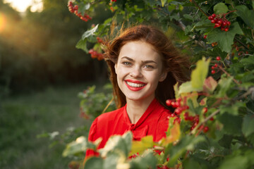smiling woman red lips posing nature fresh air summer