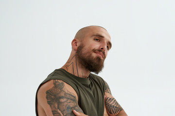 Young bald thoughtful caucasian man looking away