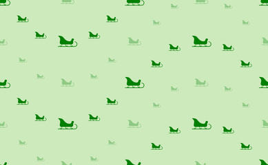 Seamless pattern of large and small green sleigh symbols. The elements are arranged in a wavy. Vector illustration on light green background