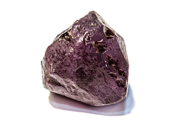 Macro of Alexandrite mineral stone in rock on white background