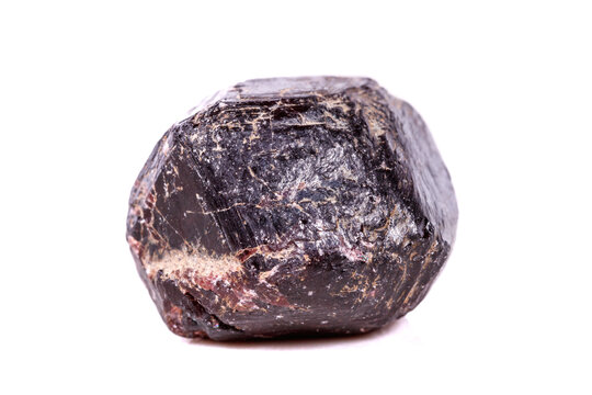 Macro of a mineral garnet stone on a white background