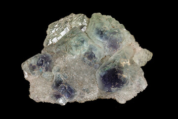 macro mineral fluorite stone on black background