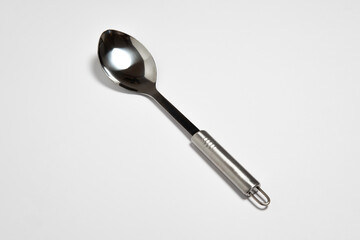 Silver spoon isolated on white background.High-resolution photo.Mock up