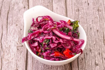 Fotobehang Pickled red cabbage with herbs © Andrei Starostin