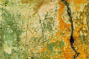 Texture of a concrete wall with cracks and scratches which can be used as a background