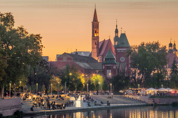 Wroclaw skyline with Amphitheater quay on foreground at dusk