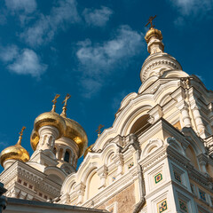 Fototapeta na wymiar bottom view of a fragment of a Russian Orthodox cathedral of the blue summer sky background