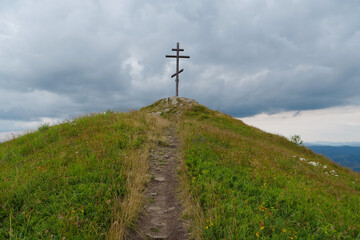 Metal cross in Carpathian Mountains in Ukraine