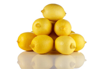 Lemons stacked in a pyramid on a white background.