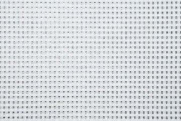 White squared intertwined plastic pad