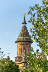 A view of the Metropolitan Orthodox Cathedral between the trees