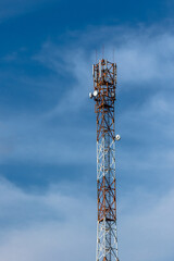 communication tower on the background of the sky